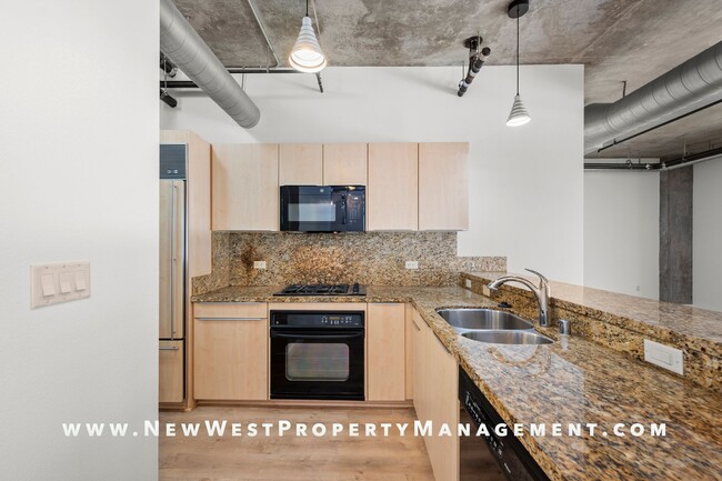 Building Photo - Expansive East Village loft at Parkloft, a...