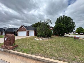 Building Photo - 4-bedroom 2 bath home in Kingsbrook, lots of storage, 2 dining areas and stand-up storm shelter! ...