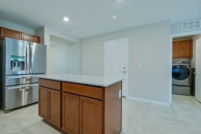 Building Photo - Mountains Edge!! Gated!!  4 bedrooms!! Primary Bedroom and bath down Stairs!! 2 Primary bedrooms!...