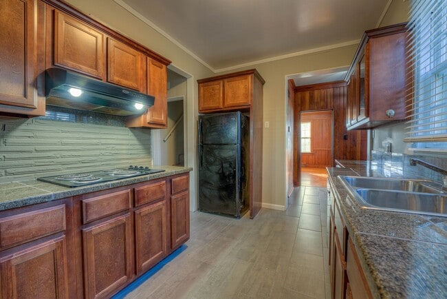Building Photo - Larger than it looks and all appliances in...