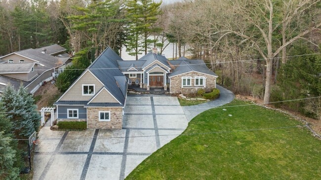 Building Photo - Stunning 5-Bed, 4.5-Bath Custom Home on Du...