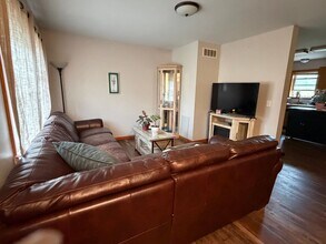 Building Photo - Spacious 3BR Duplex with Finished Basement & 2-Car Garage in Otsego