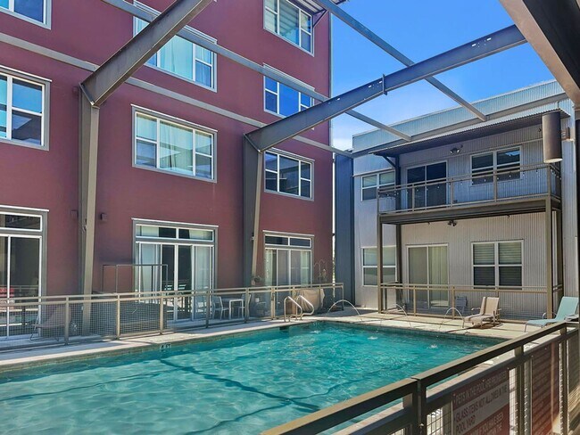 Building Photo - Modern Downtown Condo with Stunning City V...