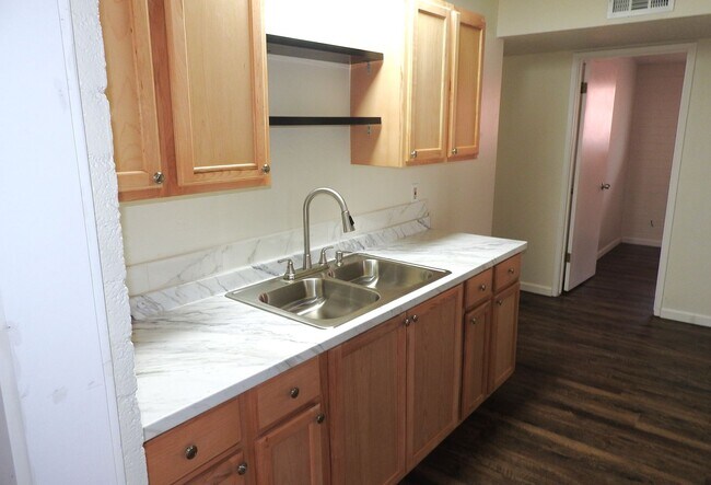 Building Photo - Beautifully Remodeled 3+1 Bungalow with Indoor-Outdoor Living