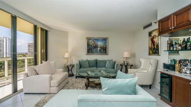 Building Photo - 20191 E Country Club Dr