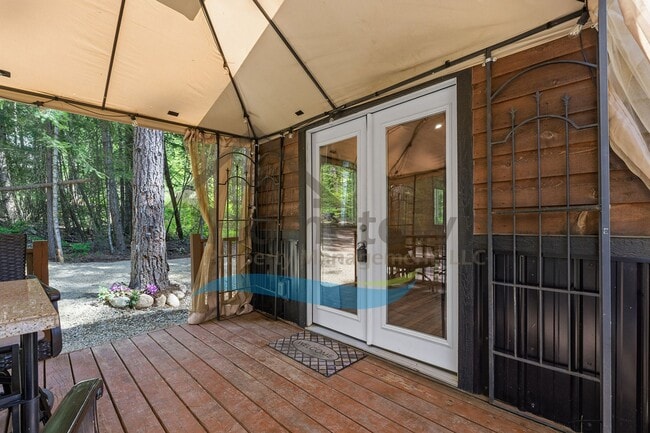 Building Photo - 1 Bedroom 1 Bath Cottage Style Studio Home with Off Street Parking Available in Sagle, Idaho!