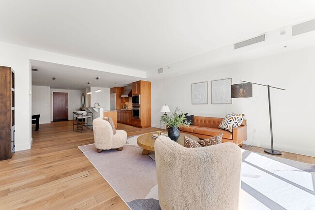 Building Photo - Gorgeous 2 bed, 3 bath Condo w/ 2 Car Gara...