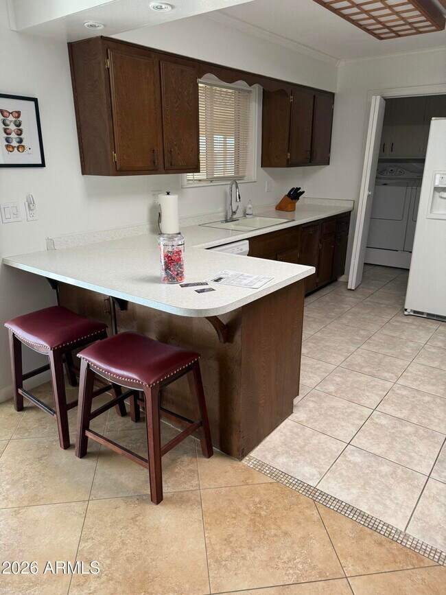 Building Photo - 10659 W Tropicana Cir