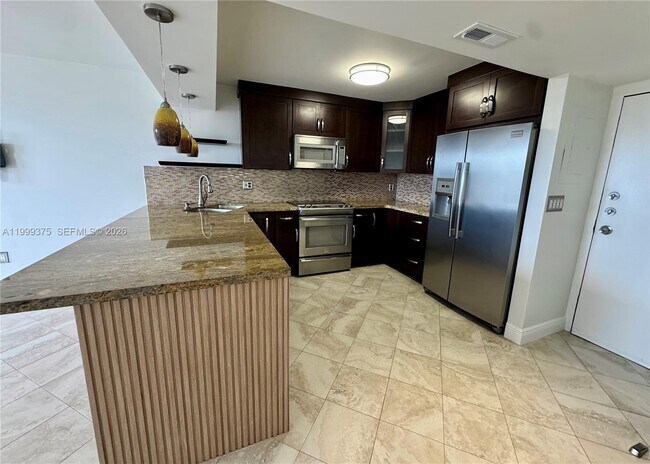 Building Photo - 14415 N Kendall Dr