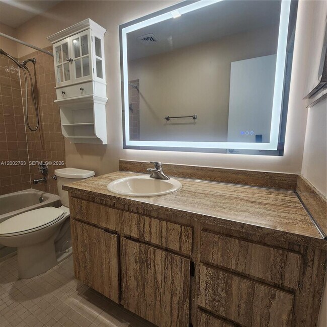 Building Photo - 11950 SW 49th Ct