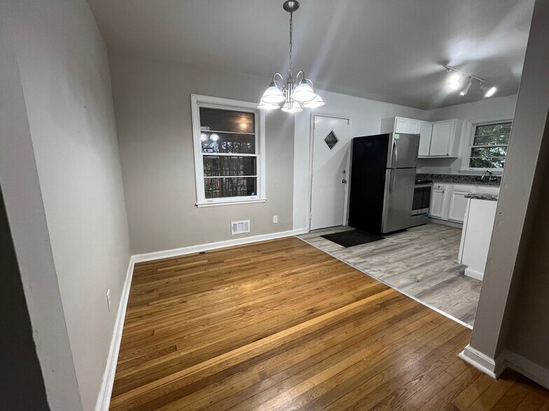 Building Photo - COMING SOON: Classic charm, peaceful living, your Forest Park retreat awaits in this spacious 3-b...