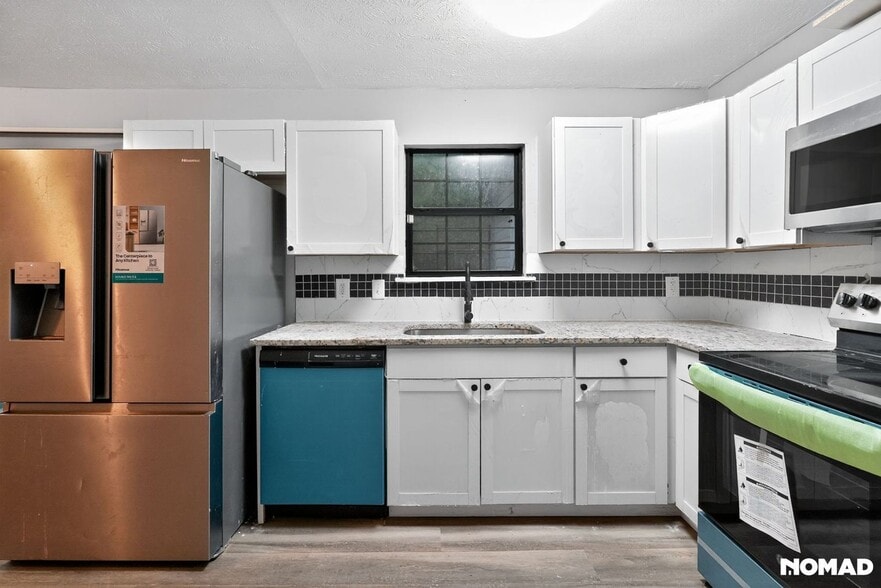 Building Photo - 5952 Stonewall Dr