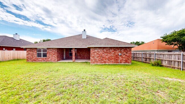 Building Photo - Charming 4-Bedroom Spacious Full-Brick Home with Modern Updates