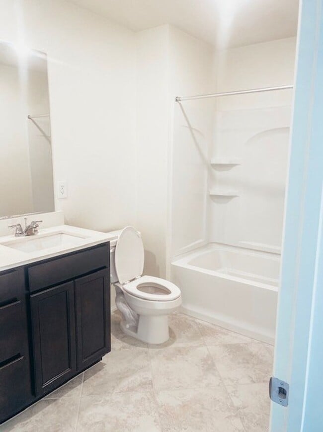 Building Photo - Beautiful Townhome in a Gated Community with 2-Car Garage!!