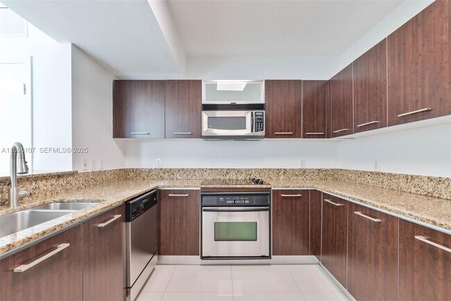 Building Photo - 9055 SW 73rd Ct