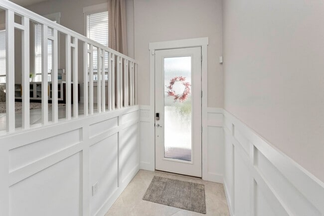Building Photo - Introducing a captivating 3-story townhome...