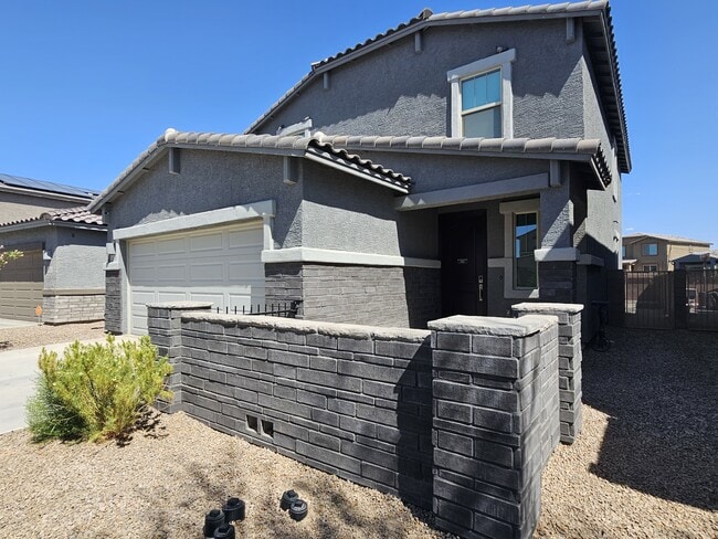 Building Photo - 10679 W Golson Dr