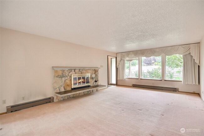 Living Room & Stone Fireplace - 3527 Shattuck Ave S