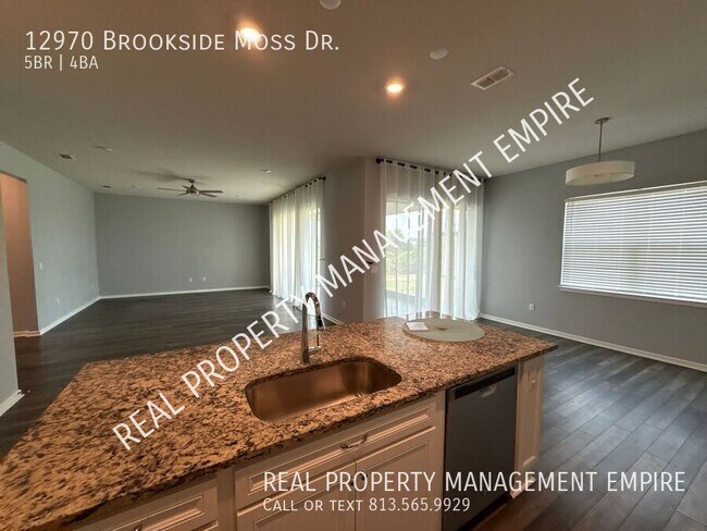 Building Photo - 12970 Brookside Moss Dr