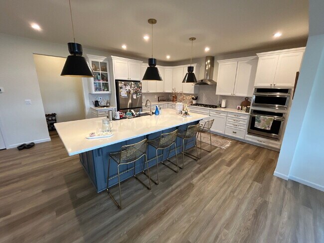Building Photo - Stunning 5-Bedroom Custom Home with Solar, EV Charging & Private Media Room