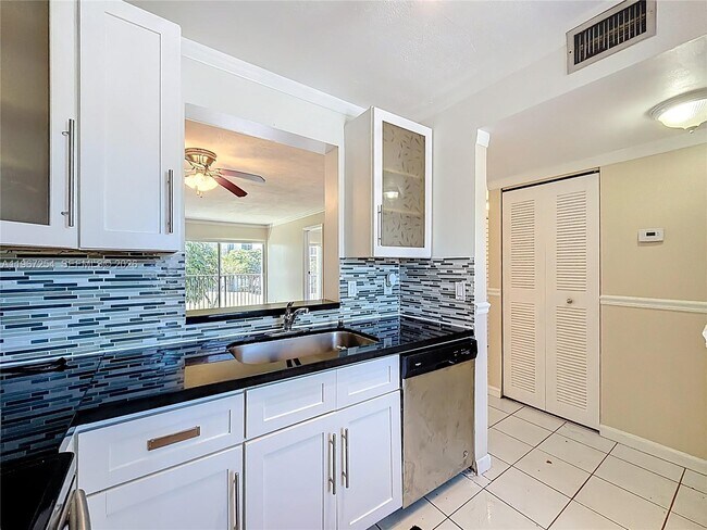 Building Photo - 8740 N Sherman Cir