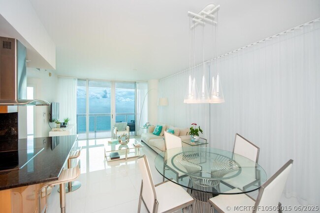 Building Photo - 6899 Collins Ave