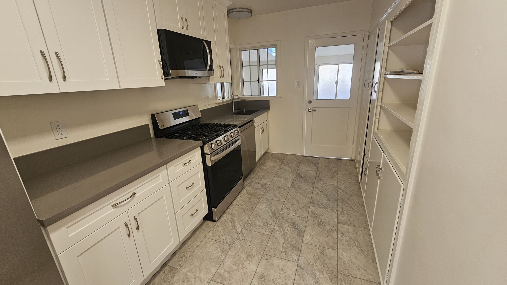 Updated Kitchen new appliances - 4049 Tilden Ave