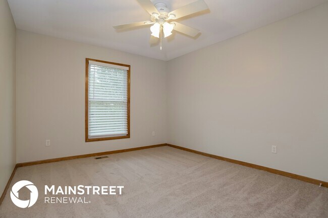 Building Photo - 5203 Woodsonia Dr