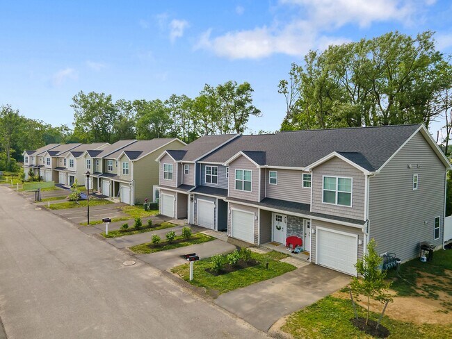 Building Photo - Marion Gardens Townhomes - New Baldwinsville Development