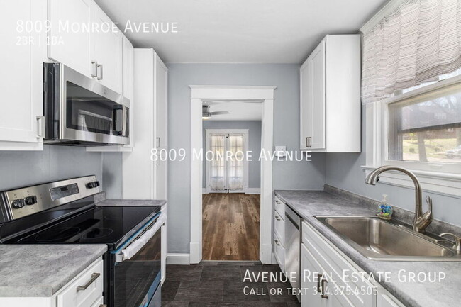 Building Photo - 8009 Monroe Ave