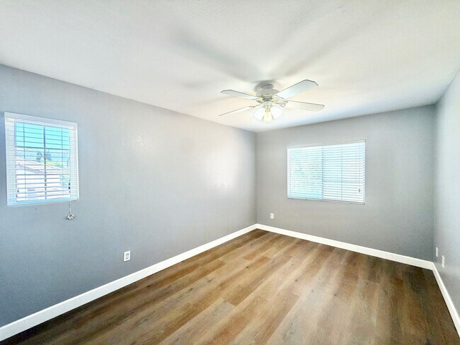 Building Photo - Spacious 5 Bedroom Home with 3 Car Garage & Primary Suite Balcony