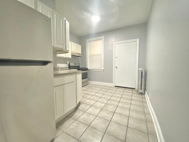 Building Photo - 1253 W Rosemont Ave