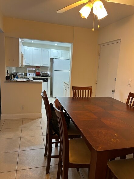 Dining room table and chairs - 480 NW 20th St