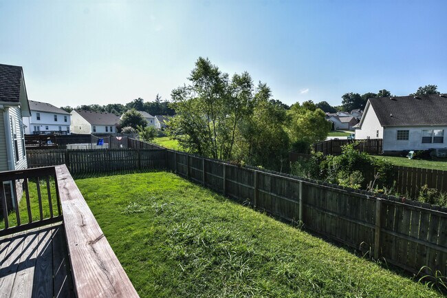 Building Photo - Pet Friendly Three Bedroom with Bonus!
