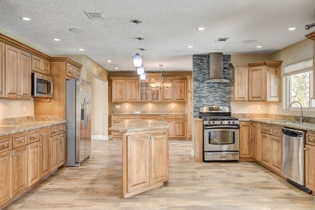 Building Photo - Gorgeous 4 Bedroom, 2 Story Home with a Beautiful Pool in the Lakes!