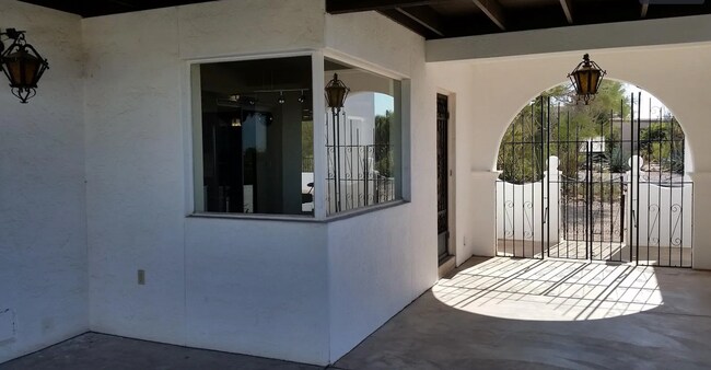 Kitchen side door, double gates to front - 5161 E Camino Bosque