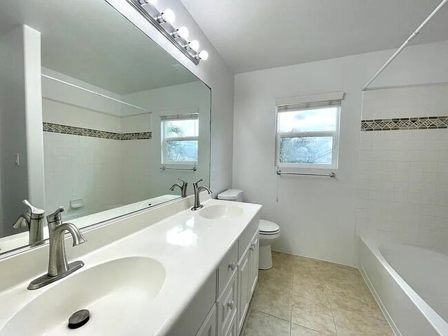 Building Photo - A stunning two-story house boasts three spacious bedrooms and 2.5 bathrooms