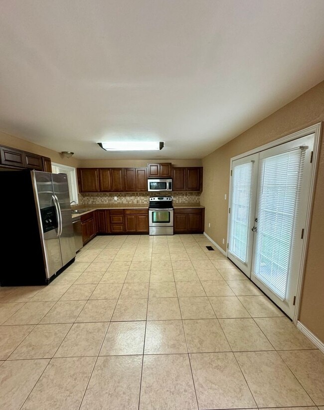 Building Photo - Adorable Rancher in Security-Widefield