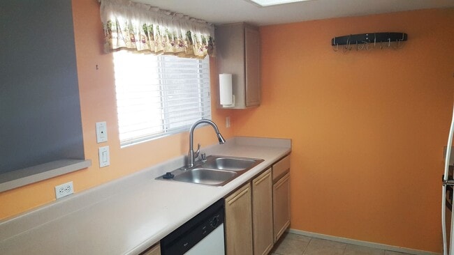 Building Photo - Three Bedroom Southwest Condo, Tile, Ground Floor