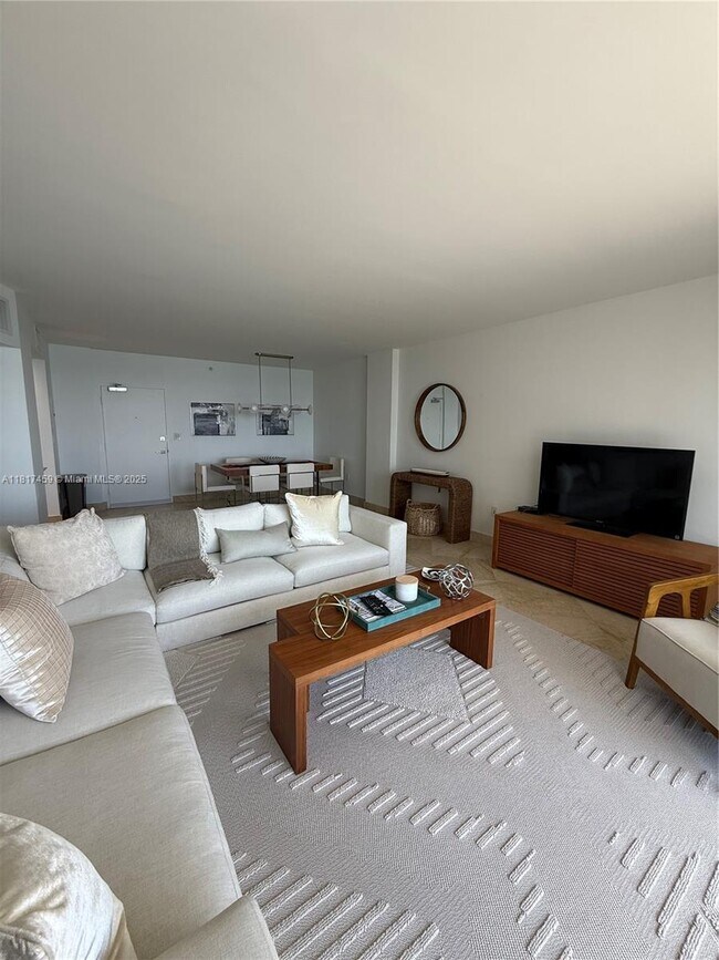 Building Photo - 10275 Collins Ave