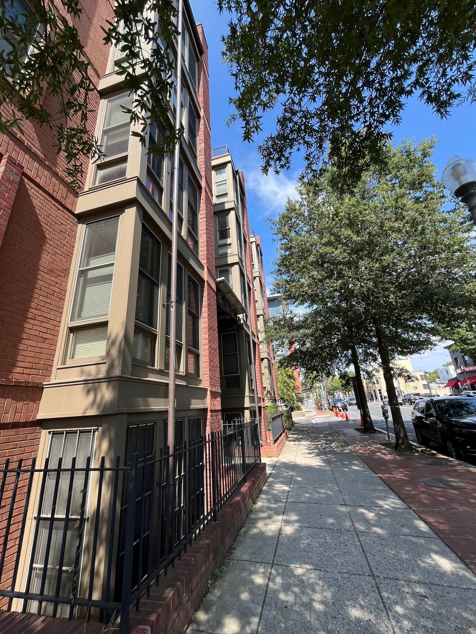 The unit looks out over the front trees. - 2910 Georgia Ave NW