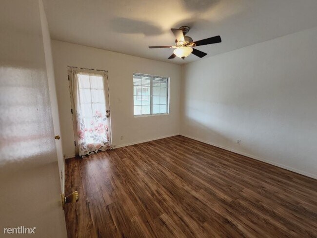 Building Photo - 4 br, 1.5 bath House - 2008 West Earll Drive