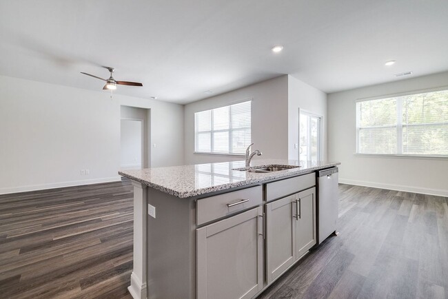 Building Photo - Beautiful 4BR Home in Woodland Trail – Top...