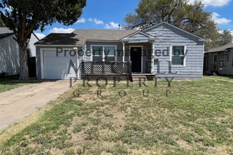 Building Photo - Welcome to 4207 S. Hughes! Nice 2 bedroom,...