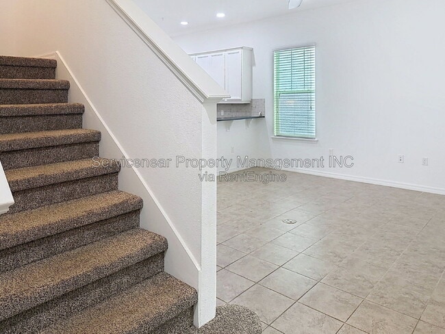 Building Photo - 9428 Woodcrane Dr