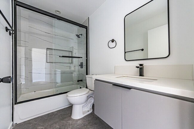 Building Photo - Stunning New 4-Bedroom Townhome with Priva...