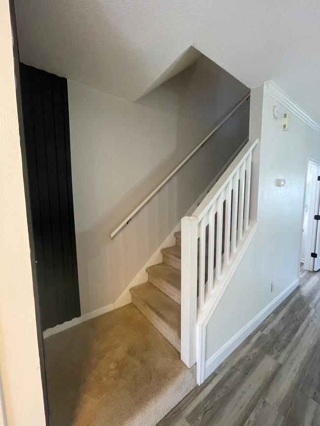 Stairs to bedrooms - 12311 Kensington Lakes Dr