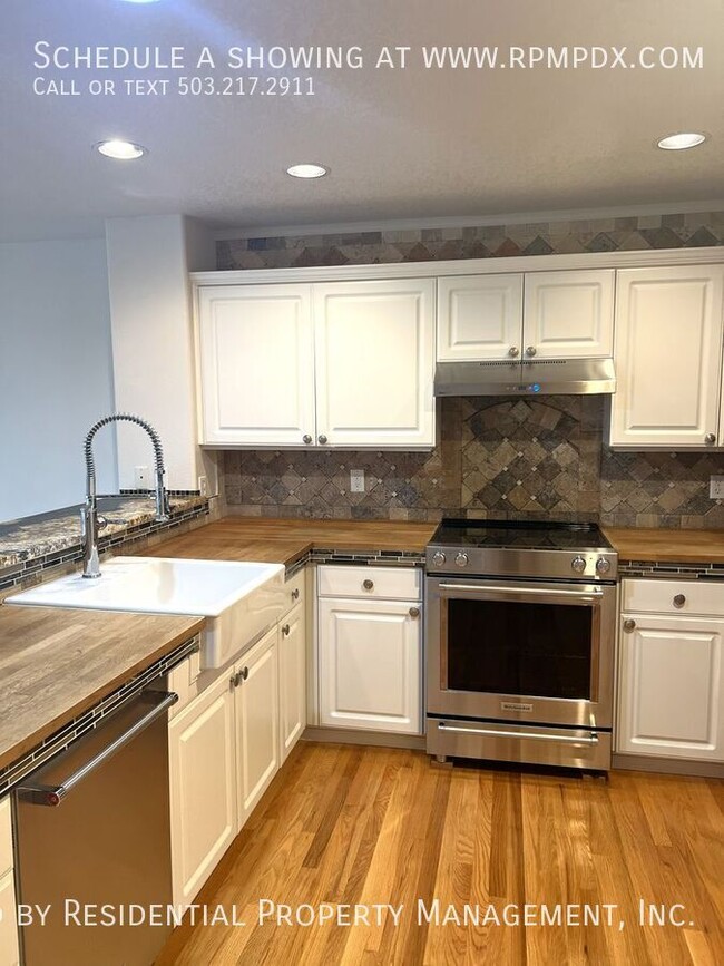 Building Photo - 6463 NW Wenmarie Dr