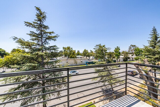 Building Photo - Contemporary 4-Bed, 4.5-Bath Townhome with...