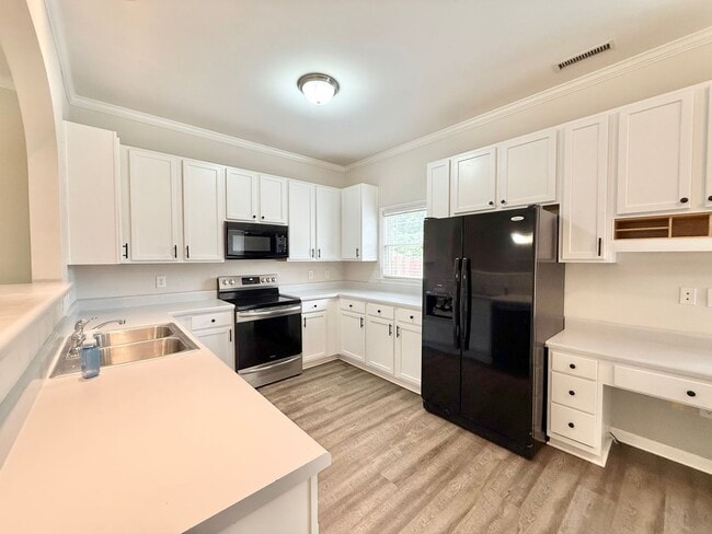 Building Photo - Charming 2BD, 2.5BA Apex Townhome in a Pri...